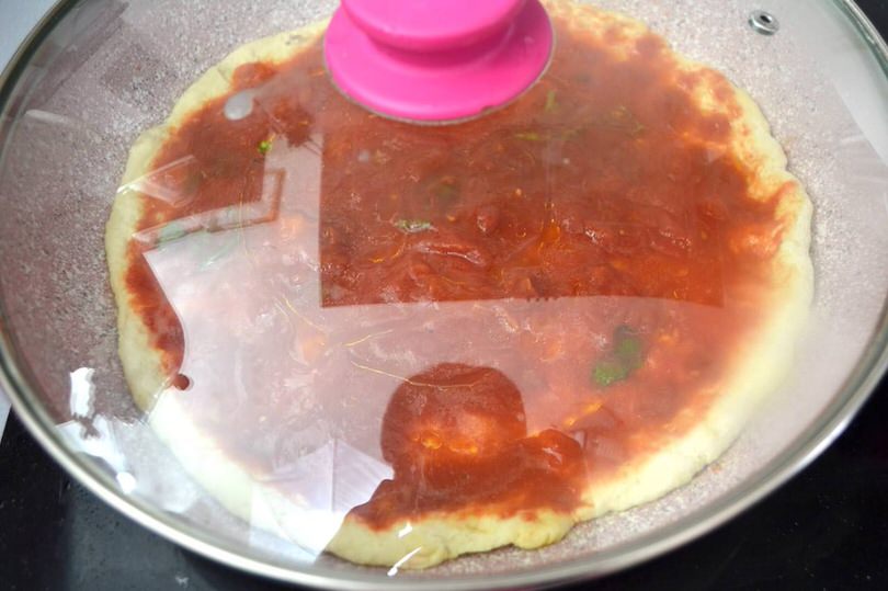 4 coprire e cuocere pizza