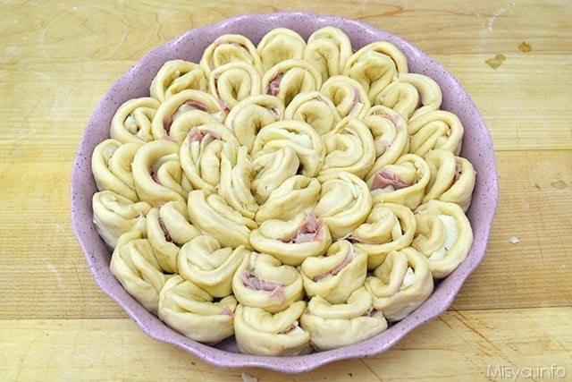 14 sistemare in una teglia tonda